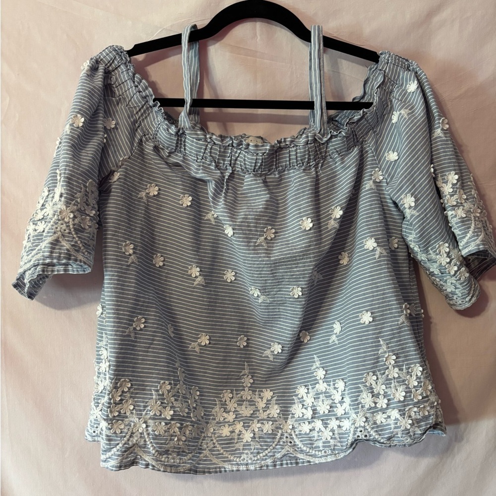 Elegant Blue Striped Blouse with White Floral Details